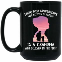 Behind Every Granddaughter Who Believes In Herself Is A Grandma Who Believed In Her First Coffee Mug - Mug 15oz - Black